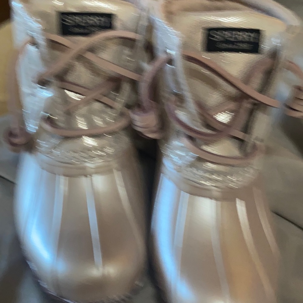 Sperry boots. New no tags never worn.